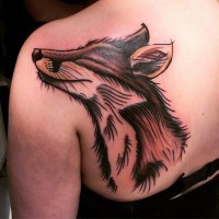 Unusual painted colored smiling fox tattoo on shoulder