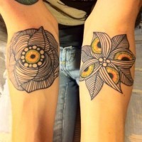 Unusual painted little colored mystical flowers tattoo on arms