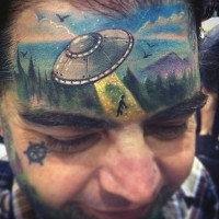 Unusual places colored alien ship with human tattoo on forehead