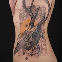 Unusual style combined black ink geometrical tattoo with animals skull tattoo on side
