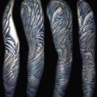 Unusual style painted and colored massive feather wing tattoo on sleeve