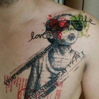 Unusual style painted colored funny boy with lettering tattoo on chest