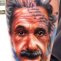 Unusual style painted multicolored big tattoo with Albert Einstein portrait on arm