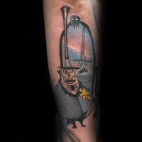 Usual cartoon style colored forearm tattoo of funny mas with big hat