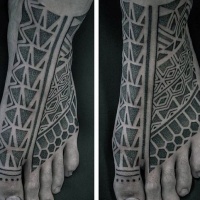 Usual design black ink tribal tattoo on foot