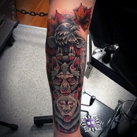 Usual designed multicolored various animals statue tattoo on arm