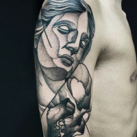 Usual dot style upper arm tattoo of woman statue with skull by Michele Zingales