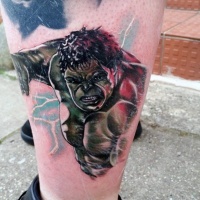 Usual multicolored leg tattoo of evil Hulk face