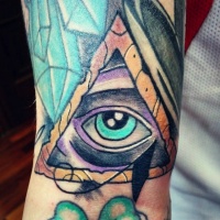 Usual multicolored triangle tattoo with mystic eye