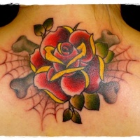 Usual style painted and colored big rose tattoo on upper back