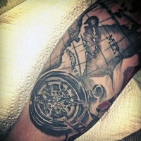 Usual style painted black ink map with compass tattoo on hand