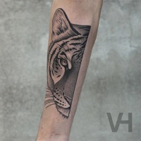 Valentin Hirsch style black ink forearm tattoo of split tiger head