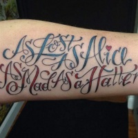 Variety colors designed literary style lettering forearm tattoo Alice in Wonderland themed