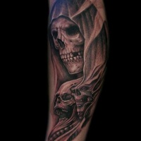 Various mystical black ink skulls tattoo on arm