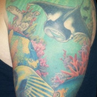 Vary realistic painted and detailed massive underwater life tattoo on shoulder
