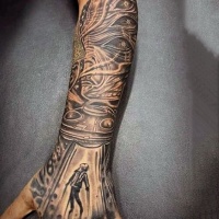 Very awesome painted black ink detailed alien ship stealing human tattoo on arm