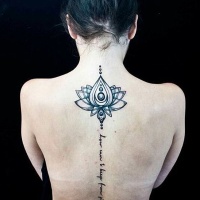 Very beautiful designed black ink big flower tattoo on upper back with lettering