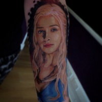 Very beautiful designed colored Game of Thrones main woman hero tattoo on forearm