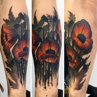Very beautiful painted and colored big floral tattoo on arm
