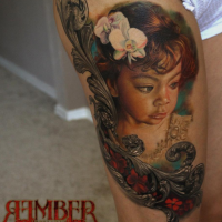Very beautiful painted colored thigh tattoo of cute girl portrait with flowers