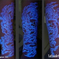 Very cool and beautiful black light dragons tattoo
