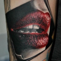 Very detailed natural colored seductive lips photo tattoo on arm