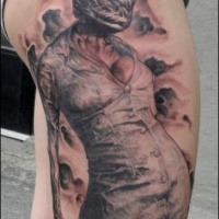 Very realistic looking colorful Silent Hill monster nurse tattoo on thigh