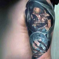Very realistic looking colorful skeleton wizard with orb tattoo on shoulder