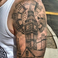 Very realistic looking large upper arm tattoo of Big Ben clock