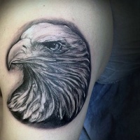 Very realistic looking white ink eagle tattoo on thigh