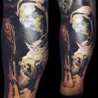 Very realistic space themed big colored tattoo on leg
