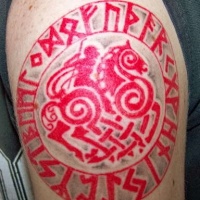 Viking tattoo of circle red seal with runes and warrior on horse