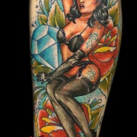 Vintage cartoons style colored sexy woman tattoo on forearm with flowers and diamond