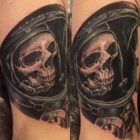 Vintage picture style colored shoulder tattoo of astronaut skeleton