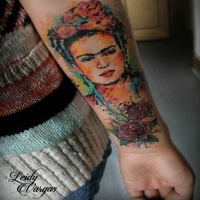 Vintage picture style very detailed forearm tattoo of nice woman face with flowers