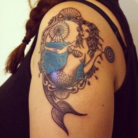 Vintage portrait like colored mermaid with lollypop tattoo on shoulder stylized with ferris wheel