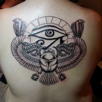 Vintage style black and white Egypt themed tattoo on back stylized with the Eye of Horus