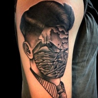 Vintage style black and white faceless shoulder length tattoo