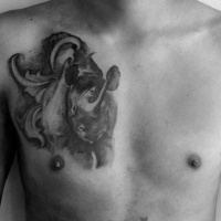 Vintage style black ink big chest tattoo of running rhino