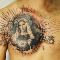 Vintage style black ink chest tattoo of antic picture with ornaments