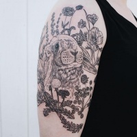 Vintage style black ink cute rabbit tattoo on shoulder with various wildflowers