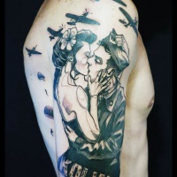 Vintage style black ink shoulder tattoo of kissing couple with plane and lettering