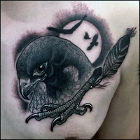 Vintage style black ink strange eagle head combined with eagle leg tattoo on chest stylized with feather