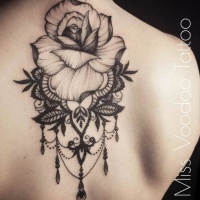 Vintage style black ink upper back tattoo of large rose with leaves by Caro Voodoo