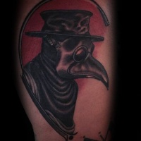 Vintage style colored arm tattoo of plague doctor portrait