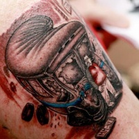 Vintage style colored biceps tattoo of old train
