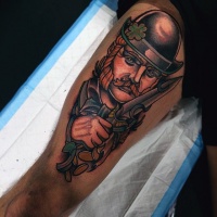 Vintage style colored detailed thigh tattoo on man with knife portrait
