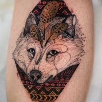 Vintage style colored leg tattoo of white wolf with ornaments by Joanna Swirska