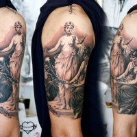 Vintage style colored shoulder tattoo of ancient statue