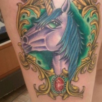 Violet unicorn colored thigh tattoo in gorgeous old style frame